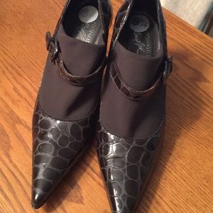 Silver and brown heels.